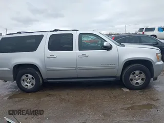 2011 Chevrolet Suburban LS with VIN 1GNSCHE06BR188407, listed as a IAAI auction lot 41453215 with 232,667 mi miles. Bid and sale history available at carsss.com. Image 13.