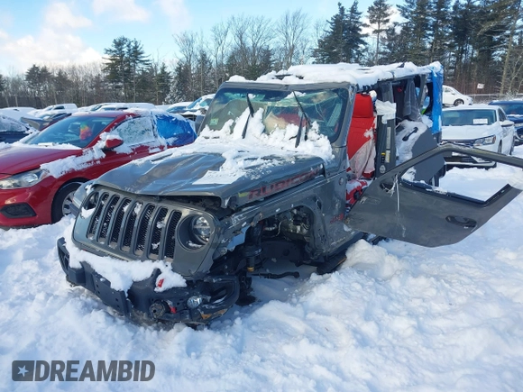 2020 Jeep Wrangler Unlimited Rubicon z VIN 1C4HJXFN5LW176104, wystawiony jako IAAI lot #41332511 z przebiegiem 70 428 mil mil oraz . Historia ofert i sprzedaży dostępna na DreamBid. Obrazek 18.