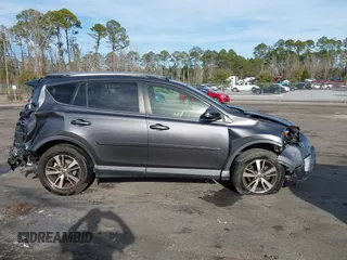 2018 Toyota RAV4 XLE with VIN JTMWFREV1JJ169926, listed as a IAAI auction lot 41464920 with 111,144 mi miles. Bid and sale history available at carsss.com. Image 13.