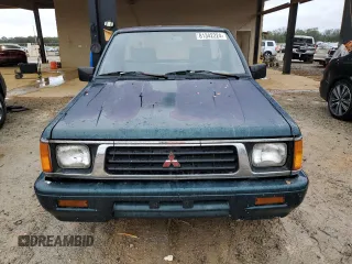 1993 Mitsubishi Mighty Max z VIN JA7LS21G6PP003529, wystawiony jako Copart lot #81342224 z przebiegiem 313 363 mil mil oraz Szkody całkowita. Historia ofert i sprzedaży dostępna na DreamBid. Obrazek 5.