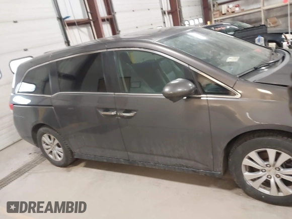 2015 Honda Odyssey EX-L with VIN 5FNRL5H64FB055890, listed as a IAAI auction lot 41706141 with 155,167 mi miles and . Bid and sale history available at carsss.com. Image 13.