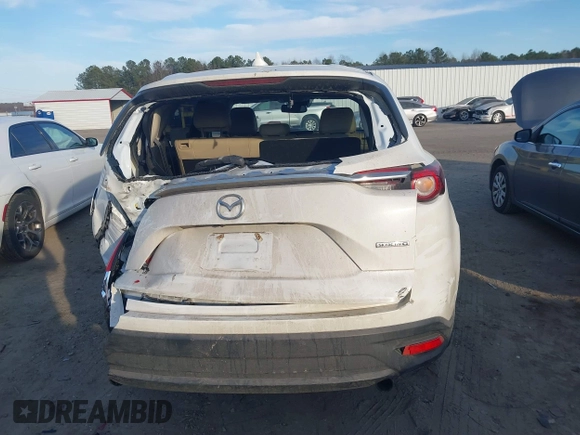 2021 Mazda CX-9 Touring with VIN JM3TCBCY1M0507696, listed as a IAAI auction lot 41681192 with 69,330 mi miles. Bid and sale history available at carsss.com. Image 17.
