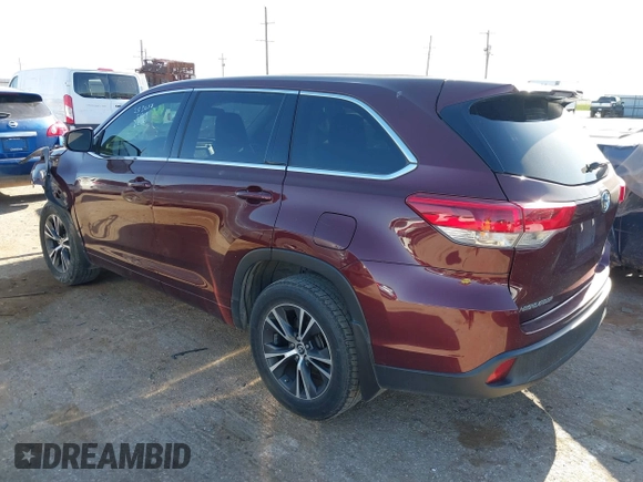 2018 Toyota Highlander LE with VIN 5TDZARFH0JS036002, listed as a IAAI auction lot 42281311 with 106,714 mi miles and . Bid and sale history available at DreamBid. Image 3.