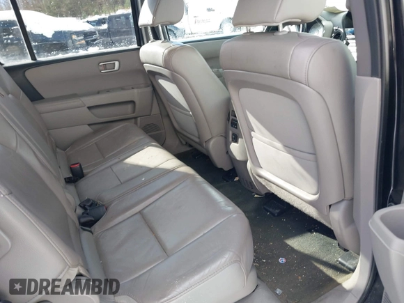 2013 Honda Pilot EX-L with VIN 5FNYF4H74DB080386, listed as a IAAI auction lot 41582077 with 285,443 mi miles and . Bid and sale history available at DreamBid. Image 8.