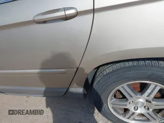 2008 Chrysler Pacifica Touring with VIN 2A8GF68X68R647367, listed as a IAAI auction lot 41463069 with 205,451 mi miles and . Bid and sale history available at DreamBid. Image 13.