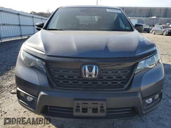 2019 Honda Passport EX-L z VIN 5FNYF8H5XKB020289, wystawiony jako Copart lot #42384545 z przebiegiem 65 083 mil mil oraz Szkoda całkowita • Salvage title. Historia ofert i sprzedaży dostępna na DreamBid. Obrazek 5.
