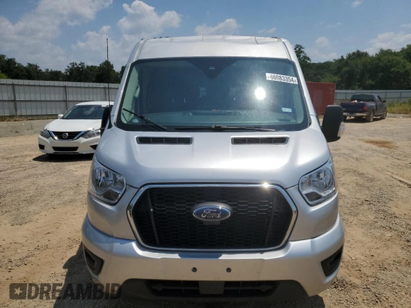 2022 Ford Transit Passenger XL z VIN 1FBAX2C86NKA19696, wystawiony jako Copart lot #66083354 z przebiegiem 40 332 mil mil oraz Szkody całkowita. Historia ofert i sprzedaży dostępna na DreamBid. Obrazek 5.