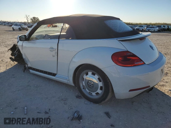 2015 Volkswagen Beetle 1.8T with VIN 3VW517AT7FM809440, listed as a Copart auction lot 84334724 with Not provided miles and Salvage title. Bid and sale history available at DreamBid. Image 2.