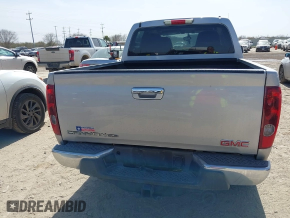 2010 GMC Canyon SLE1 z VIN 1GTJSCDEXA8130361, wystawiony jako IAAI lot #41734671 z przebiegiem 52 621 mil mil oraz . Historia ofert i sprzedaży dostępna na DreamBid. Obrazek 16.