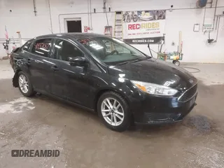 2015 Ford Focus SE with VIN 1FADP3F24FL285287, listed as a IAAI auction lot 41937687 with 130,460 mi miles. Bid and sale history available at carsss.com. Image 1.