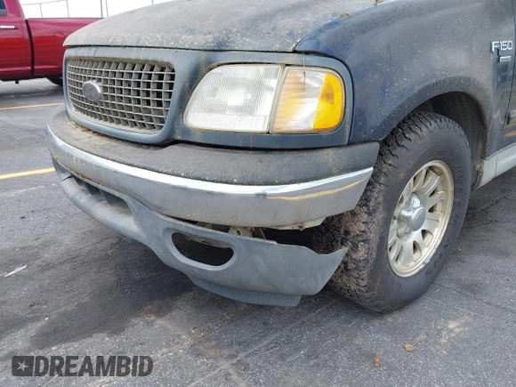 2003 Ford F-150 XLT with VIN 1FTRW076X3KC61967, listed as a IAAI auction lot 42016065 with 206,256 mi miles. Bid and sale history available at carsss.com. Image 6.