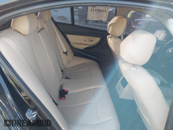2018 BMW 3 Series 320i xDrive with VIN WBA8E5G57JNU47770, listed as a IAAI auction lot 41409122 with 62,198 mi miles. Bid and sale history available at carsss.com. Image 8.