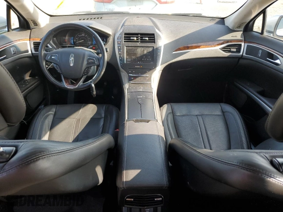 2014 Lincoln MKZ Hybrid z VIN 3LN6L2LU7ER821918, wystawiony jako Copart lot #60754555 z przebiegiem 128 295 mil mil oraz Szkoda całkowita • Salvage title. Historia ofert i sprzedaży dostępna na DreamBid. Obrazek 8.