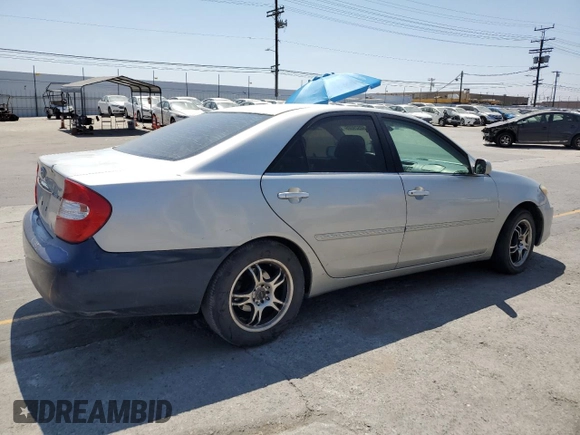 2004 Toyota Camry LE with VIN 4T1BE32K94U300544, listed as a Copart auction lot 60529005 with 223,940 mi miles and Clean title. Bid and sale history available at DreamBid. Image 3.