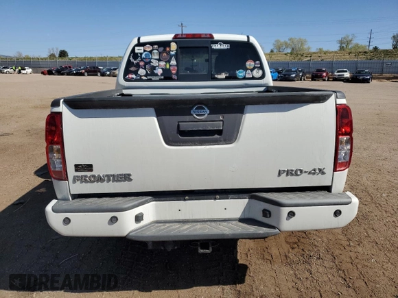 2018 Nissan Frontier Pro-4X with VIN 1N6AD0EV1JN715111, listed as a Copart auction lot 54012255 with 127,409 mi miles and Salvage title. Bid and sale history available at DreamBid. Image 6.