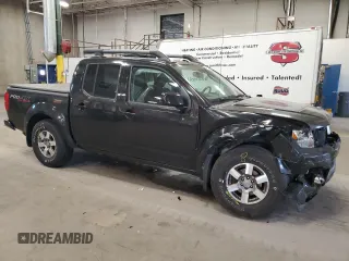 2011 Nissan Frontier Pro-4X with VIN 1N6AD0EVXBC449326, listed as a Copart auction lot 54994455 with 93,841 mi miles and Salvage title. Bid and sale history available at DreamBid. Image 4.