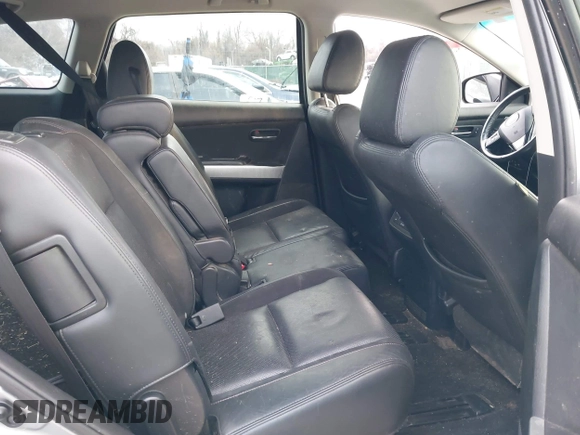 2013 Mazda CX-9 Grand Touring z VIN JM3TB3DV1D0401102, wystawiony jako IAAI lot #41248346 z przebiegiem 122 555 mil mil oraz . Historia ofert i sprzedaży dostępna na DreamBid. Obrazek 8.