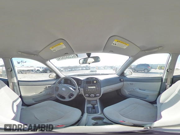 2009 Kia Spectra LX with VIN KNAFE221895659552, listed as a Copart auction lot 82555924 with 114,704 mi miles and Salvage Title. Bid and sale history available at carsss.com. Image 12.