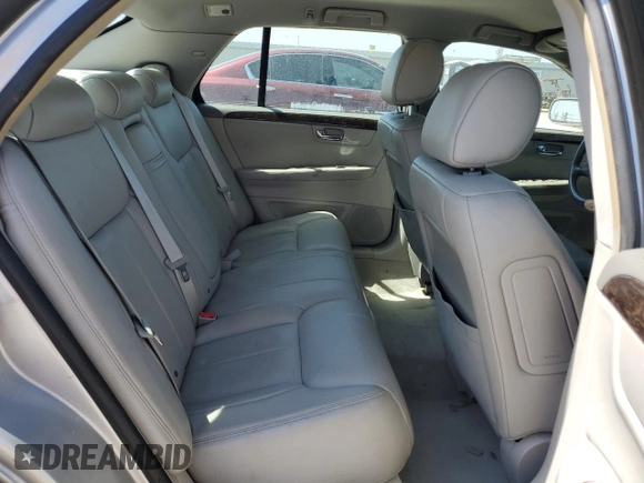 2008 Cadillac DTS 1SA z VIN 1G6KD57Y38U183004, wystawiony jako Copart lot #50410805 z przebiegiem Nie podano mil oraz Szkoda całkowita • Salvage title. Historia ofert i sprzedaży dostępna na DreamBid. Obrazek 10.
