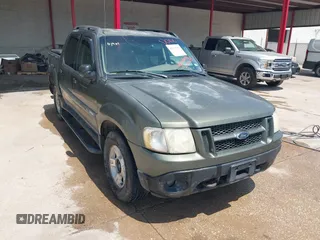 2001 Ford Explorer Sport Trac z VIN 1FMZU67E61UB92823, wystawiony jako IAAI lot #42513900 z przebiegiem 186 525 mil mil oraz . Historia ofert i sprzedaży dostępna na DreamBid. Obrazek 1.