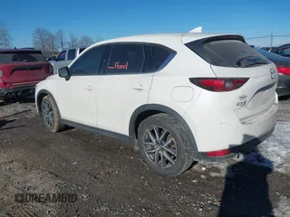 2017 Mazda CX-5 Grand Touring with VIN JM3KFBDL2H0171021, listed as a IAAI auction lot 41619642 with 67,581 mi miles. Bid and sale history available at carsss.com. Image 3.