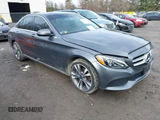 2018 Mercedes-Benz C C 300 with VIN 55SWF4KB7JU244583, listed as a IAAI auction lot 41974535 with 105,773 mi miles. Bid and sale history available at carsss.com. Image 1.