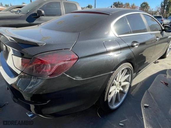 2013 BMW 6 Series 640i with VIN WBA6A0C5XDDF14354, listed as a Copart auction lot 43290645 with 123,166 mi miles and Clean Title. Bid and sale history available at carsss.com. Image 4.