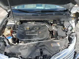 2014 Lincoln MKZ z VIN 3LN6L2G91ER831043, wystawiony jako Copart lot #63109715 z przebiegiem Nie podano mil oraz Szkoda całkowita • Salvage title. Historia ofert i sprzedaży dostępna na DreamBid. Obrazek 11.
