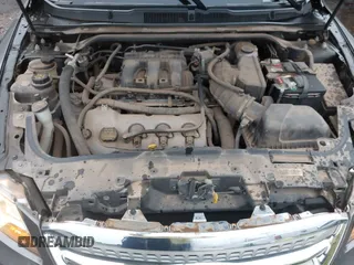 2011 Ford Taurus SE with VIN 1FAHP2DW2BG181059, listed as a IAAI auction lot 42036867 with 103,394 mi miles. Bid and sale history available at carsss.com. Image 10.