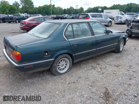 1994 BMW 7 Series with VIN WBAGD8320RDE90248, listed as a IAAI auction lot 42685094 with Not provided miles and . Bid and sale history available at DreamBid. Image 4.