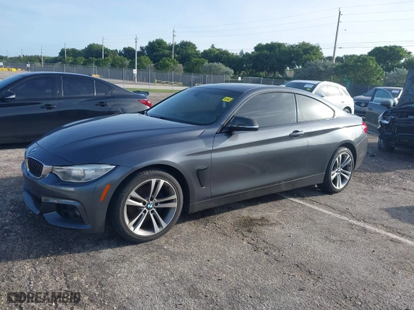 2014 BMW 4 Series 428i xDrive with VIN WBA3N5C57EK196790, listed as a IAAI auction lot 40571670 with 108,114 mi miles. Bid and sale history available at carsss.com. Image 17.