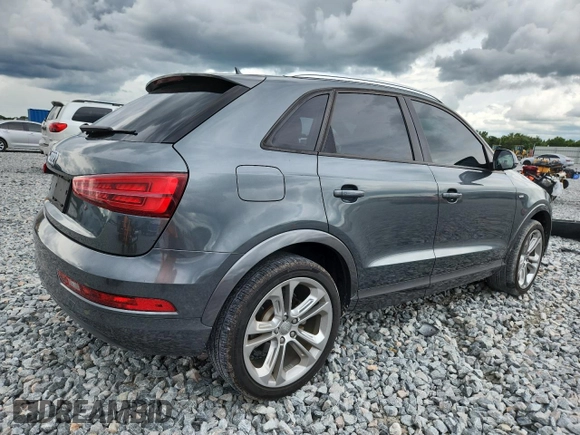 2018 Audi Q3 Premium z VIN WA1BCCFS3JR015478, wystawiony jako Copart lot #59613945 z przebiegiem 96 841 mil mil oraz Szkoda całkowita • Salvage title. Historia ofert i sprzedaży dostępna na DreamBid. Obrazek 3.