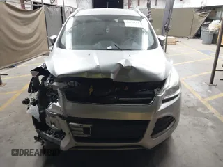 2015 Ford Escape Titanium with VIN 1FMCU0J96FUB81598, listed as a IAAI auction lot 41872114 with 122,001 mi miles and . Bid and sale history available at DreamBid. Image 12.