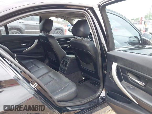 2013 BMW 3 Series 328i xDrive with VIN WBA3B5G59DNS00693, listed as a IAAI auction lot 42540218 with 125,213 mi miles and . Bid and sale history available at DreamBid. Image 8.