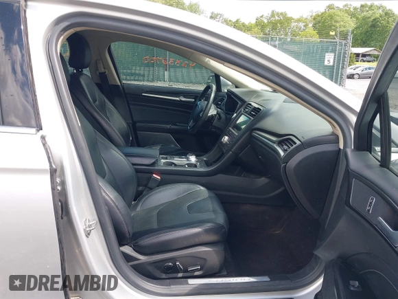 2017 Ford Fusion Titanium with VIN 3FA6P0K99HR112234, listed as a IAAI auction lot 42332700 with 106,685 mi miles and . Bid and sale history available at DreamBid. Image 5.