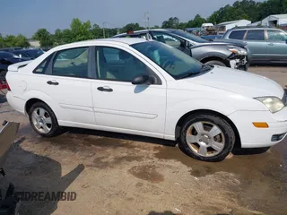 2005 Ford Focus S with VIN 1FAHP34N45W230950, listed as a IAAI auction lot 42467778 with 203,697 mi miles and . Bid and sale history available at DreamBid. Image 13.