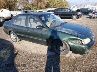 2002 Toyota Corolla CE with VIN 2T1BR12EX2C875267, listed as a Copart auction lot 77607294 with 267,148 mi miles and Clean title. Bid and sale history available at DreamBid. Image 4.