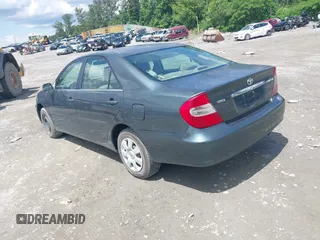 2003 Toyota Camry LE with VIN 4T1BE32K23U785060, listed as a IAAI auction lot 41825336 with 205,751 mi miles and . Bid and sale history available at DreamBid. Image 3.
