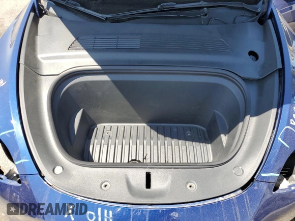 2021 Tesla Model Y Performance z VIN 5YJYGDEF0MF157795, wystawiony jako Copart lot #57163245 z przebiegiem 62 598 mil mil oraz Szkoda całkowita • Salvage title. Historia ofert i sprzedaży dostępna na DreamBid. Obrazek 11.