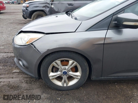 2014 Ford Focus SE with VIN 1FADP3K28EL313161, listed as a IAAI auction lot 42017640 with 111,962 mi miles. Bid and sale history available at carsss.com. Image 12.