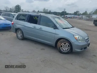 2007 Honda Odyssey EX-L z VIN 5FNRL38757B046761, wystawiony jako IAAI lot #41943033 z przebiegiem 309 270 mil mil oraz . Historia ofert i sprzedaży dostępna na DreamBid. Obrazek 1.
