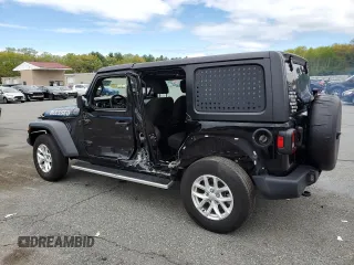 2023 Jeep Wrangler Sport S with VIN 1C4HJXDN6PW618252, listed as a Copart auction lot 55939455 with 69,681 mi miles and Salvage title. Bid and sale history available at DreamBid. Image 2.