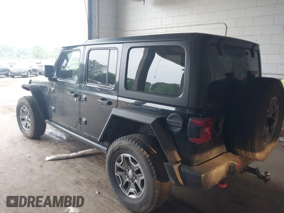2021 Jeep Wrangler Unlimited Rubicon with VIN 1C4HJXFN2MW587168, listed as a IAAI auction lot 42472309 with 66,272 mi miles and . Bid and sale history available at DreamBid. Image 3.