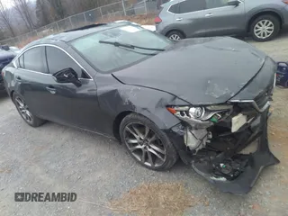 2014 Mazda 6 i Grand Touring with VIN JM1GJ1W60E1160555, listed as a IAAI auction lot 41785387 with Not Provided miles. Bid and sale history available at carsss.com. Image 1.
