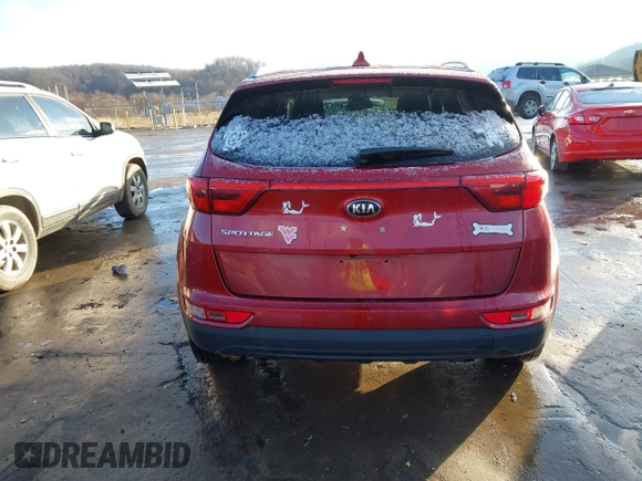 2018 Kia Sportage LX z VIN KNDPMCAC8J7360591, wystawiony jako IAAI lot #38685134 z przebiegiem 95 649 mil mil oraz . Historia ofert i sprzedaży dostępna na DreamBid. Obrazek 16.