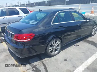 2014 Mercedes-Benz E 350 Sport with VIN WDDHF5KB1EB015573, listed as a IAAI auction lot 42731599 with 233,540 mi miles and . Bid and sale history available at DreamBid. Image 4.