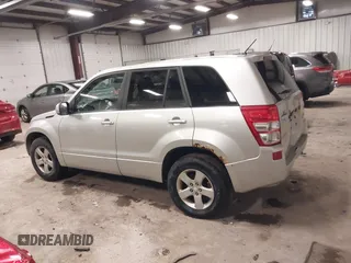 2012 Suzuki Grand Vitara Premium z VIN JS3TD0D62C4100440, wystawiony jako IAAI lot #41711815 z przebiegiem 171 527 mil mil oraz . Historia ofert i sprzedaży dostępna na DreamBid. Obrazek 14.