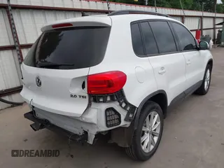 2015 Volkswagen Tiguan R-Line with VIN WVGAV7AX5FW585248, listed as a IAAI auction lot 41909618 with 137,448 mi miles and . Bid and sale history available at DreamBid. Image 4.