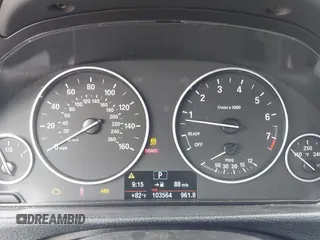 2013 BMW 3 Series 320i with VIN WBA3B1C53DK128602, listed as a IAAI auction lot 41952771 with 103,564 mi miles and . Bid and sale history available at carsss.com. Image 7.