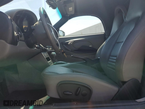 2003 Porsche Boxster with VIN WP0CA29803U623260, listed as a Copart auction lot 54511835 with 53,596 mi miles and Salvage title. Bid and sale history available at DreamBid. Image 7.